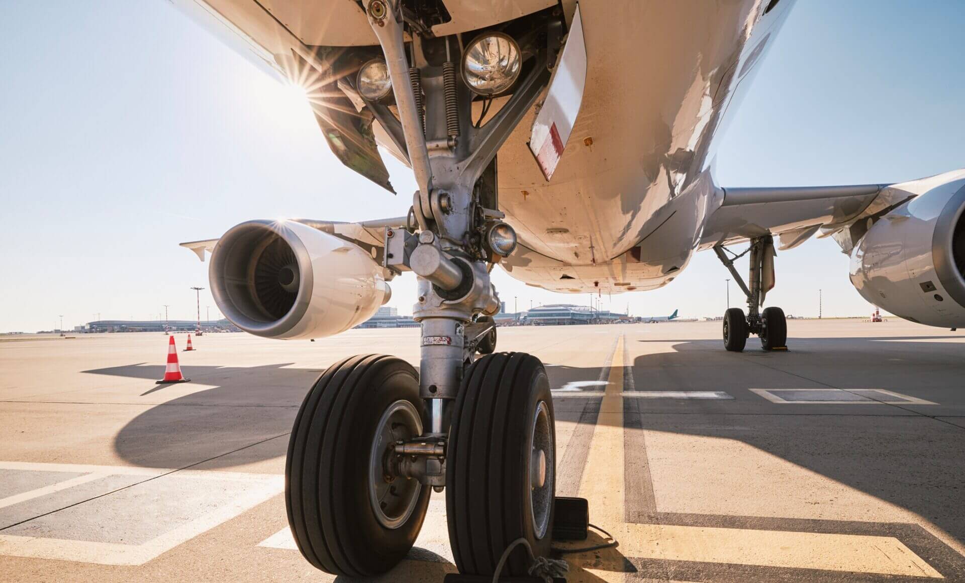 Cargo aircraft being loaded on a tarmac, representing the dangerous goods air transport rules discussed in HSC's free ICAO Dangerous Goods Panel webinar on September 8, 2026